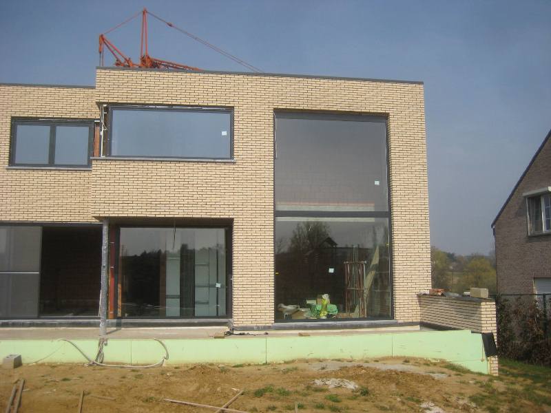 Moderne energiezuinige nieuwbouw in Assent Bekkevoort - werf - Architectengroep Janssens