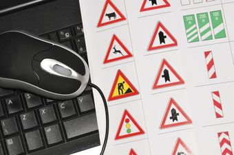 Highway code road symbols on a piece of paper