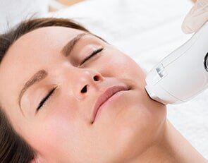 Beautician Giving Laser Epilation Treatment To Woman Face - Laser Hair Removal in Hills, NY Beautician Giving Laser Epilation Treatment To Woman Face - Laser Hair Removal in Hills, NY