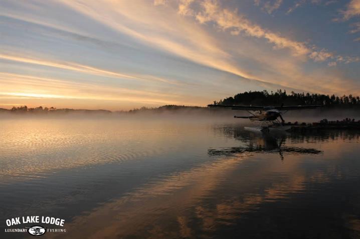 Man boating on Oak Lake.