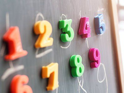 Cute Toddler With Blackboard - Preschool Teaching Services in Quincy, MA Cute Toddler With Blackboard - Preschool Teaching Services in Quincy, MA
