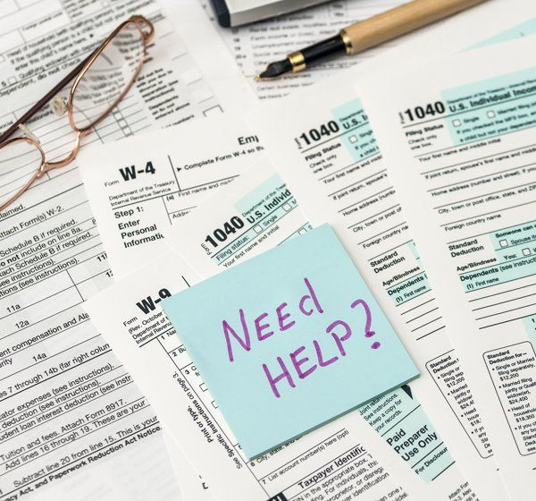 Need help sticky note placed above of tax forms — Long Beach, MS — Mallette Accountants LLC Need help sticky note placed above of tax forms — Long Beach, MS — Mallette Accountants LLC