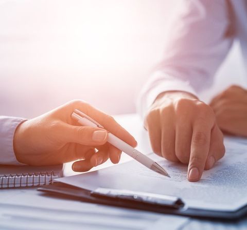 Accounting agent and his client talking about personalized bookkeeping — Long Beach, MS — Mallette Accountants LLC Accounting agent and his client talking about personalized bookkeeping — Long Beach, MS — Mallette Accountants LLC