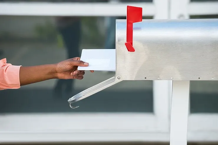 Handing Mail To A Mail Box — Hanover, PA — Kalasnik Law Office LLC