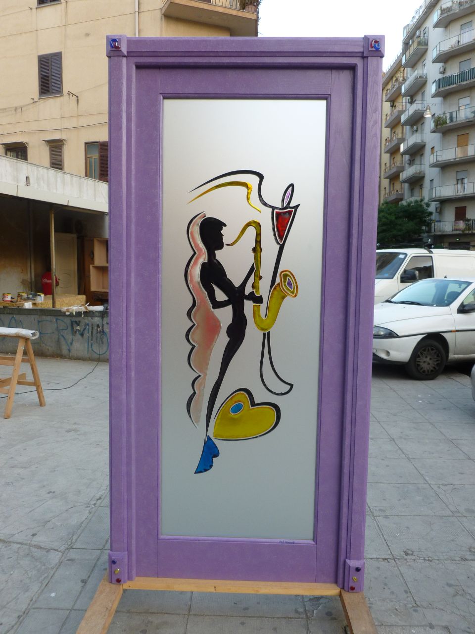 realizzazione disegno su vetrata