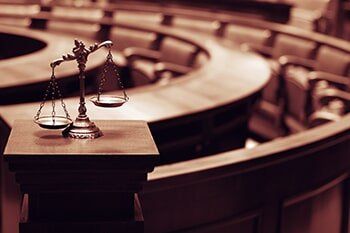 Criminal Lawyer — Decorative Scales of Justice in the Courtroom in Jasper, AL