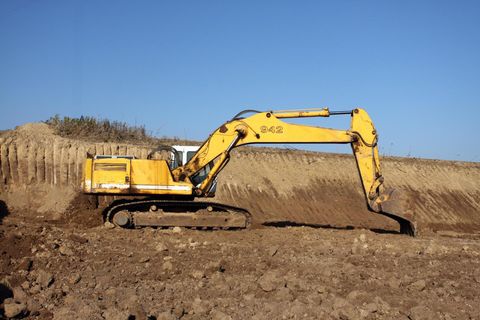 an excavator truck on a quarry