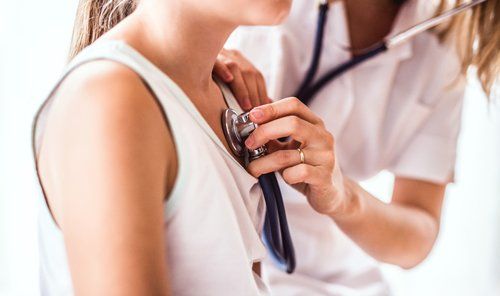 Woman Having Heart Check-up — Denham Springs, LA — Denham Finance, Inc.