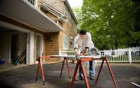 Carpenter working on a house