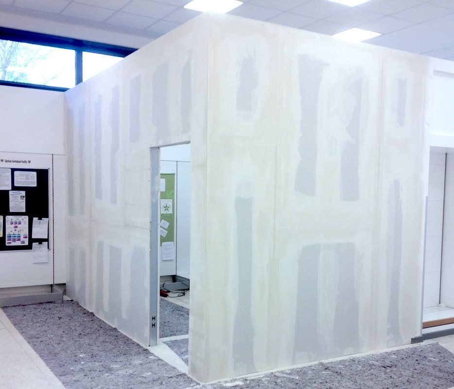 Before and after pictures of an interior commercial office renovation. This is the before picture.