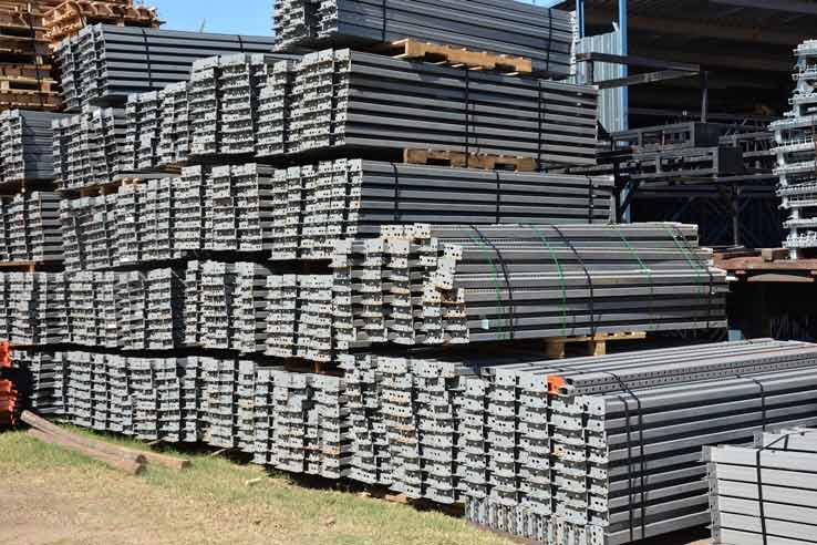 Warehouse Pallet Rack Beams — Pile of Pallet Rack Beams in Grand Prairie, TX