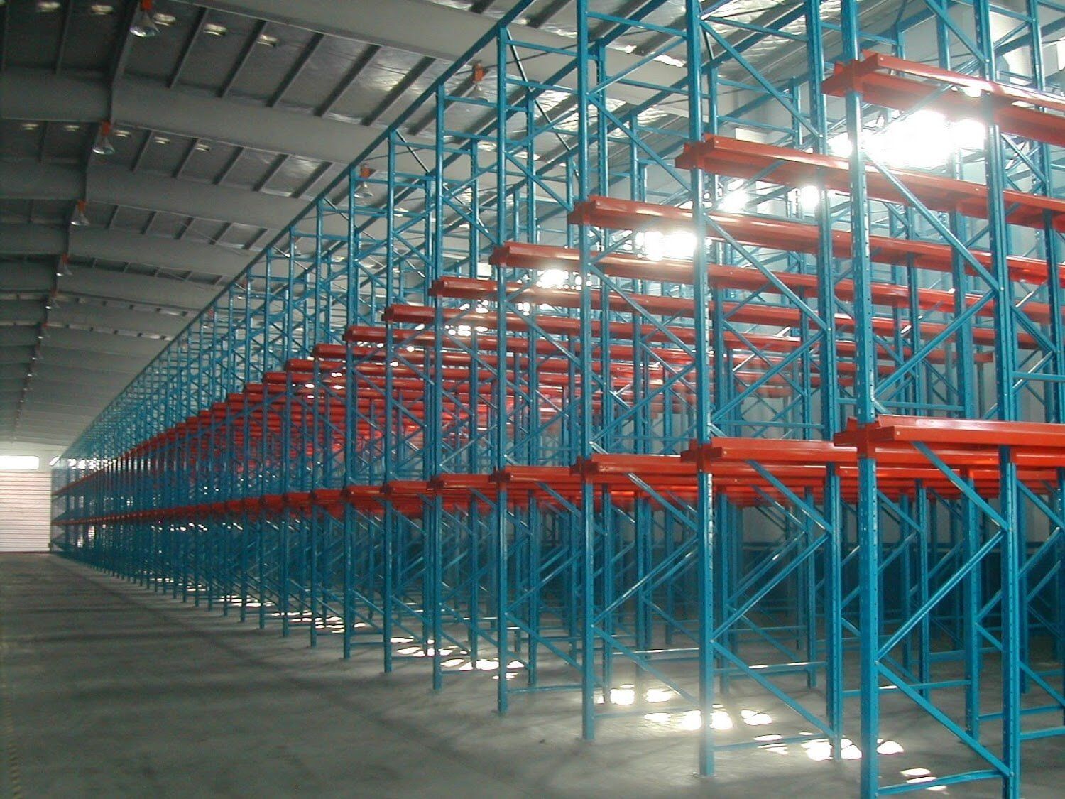 Storage Control — Orange and Blue Green Drive-In Pallet Rack in Grand Prairie, TX