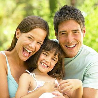 Happy Family — Family Dentistry in Raonoke Rapids, NC