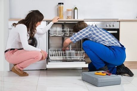 Appliances Service — Man Repairing Dish Cabinet in Roslindale, MA