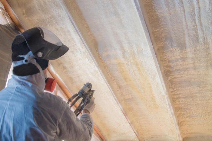 worker busy creating insulation layer