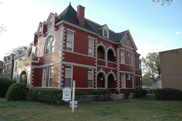 A large property with red exterior from Dickson Properties