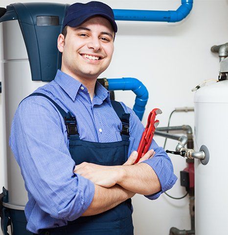 Plumber Holding Plumbing Wrench — Brunswick, GA — Rooter Express Plumbing & Drain Plumber Holding Plumbing Wrench — Brunswick, GA — Rooter Express Plumbing & Drain