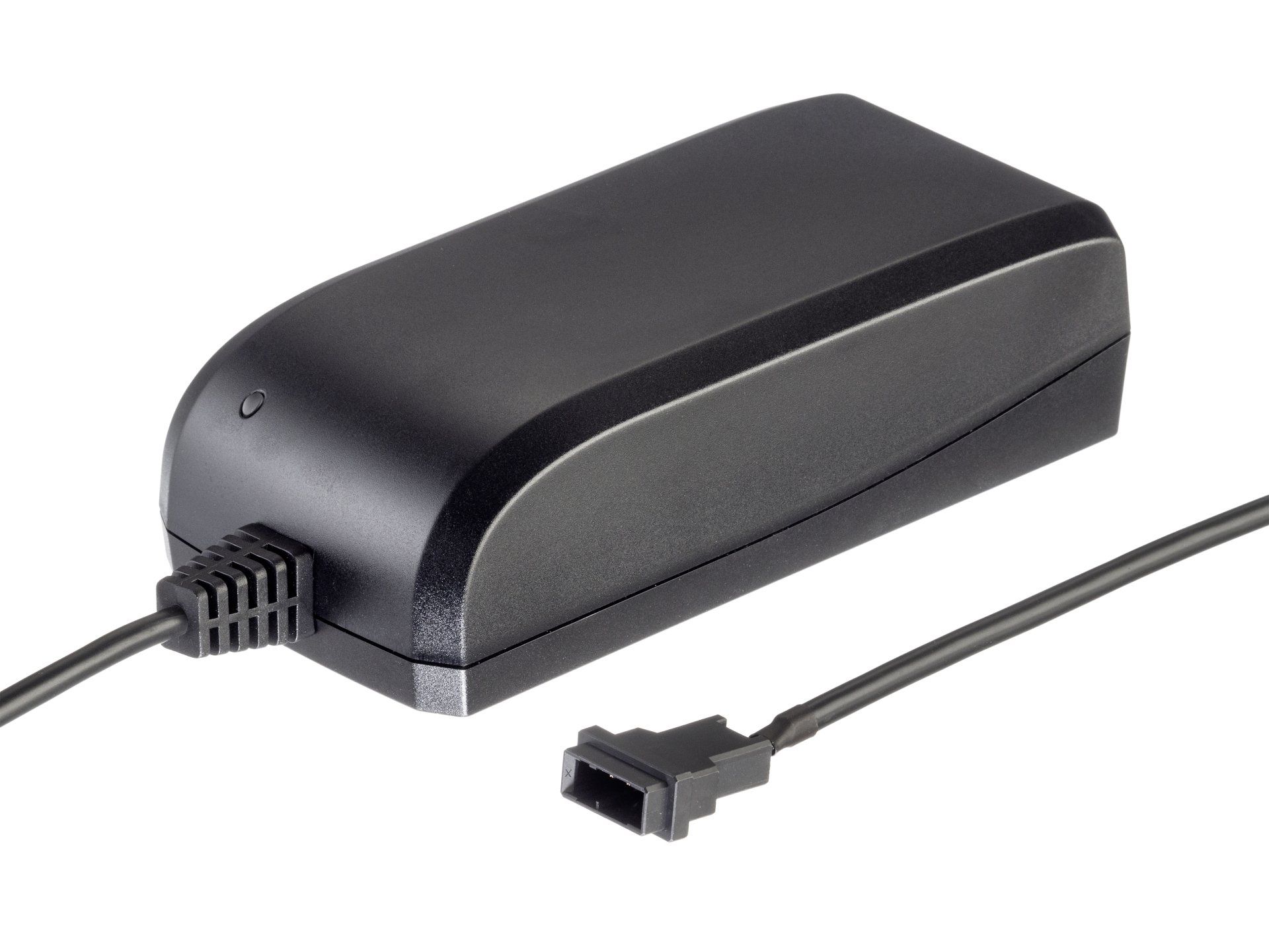 A black charger with a cord attached to it
