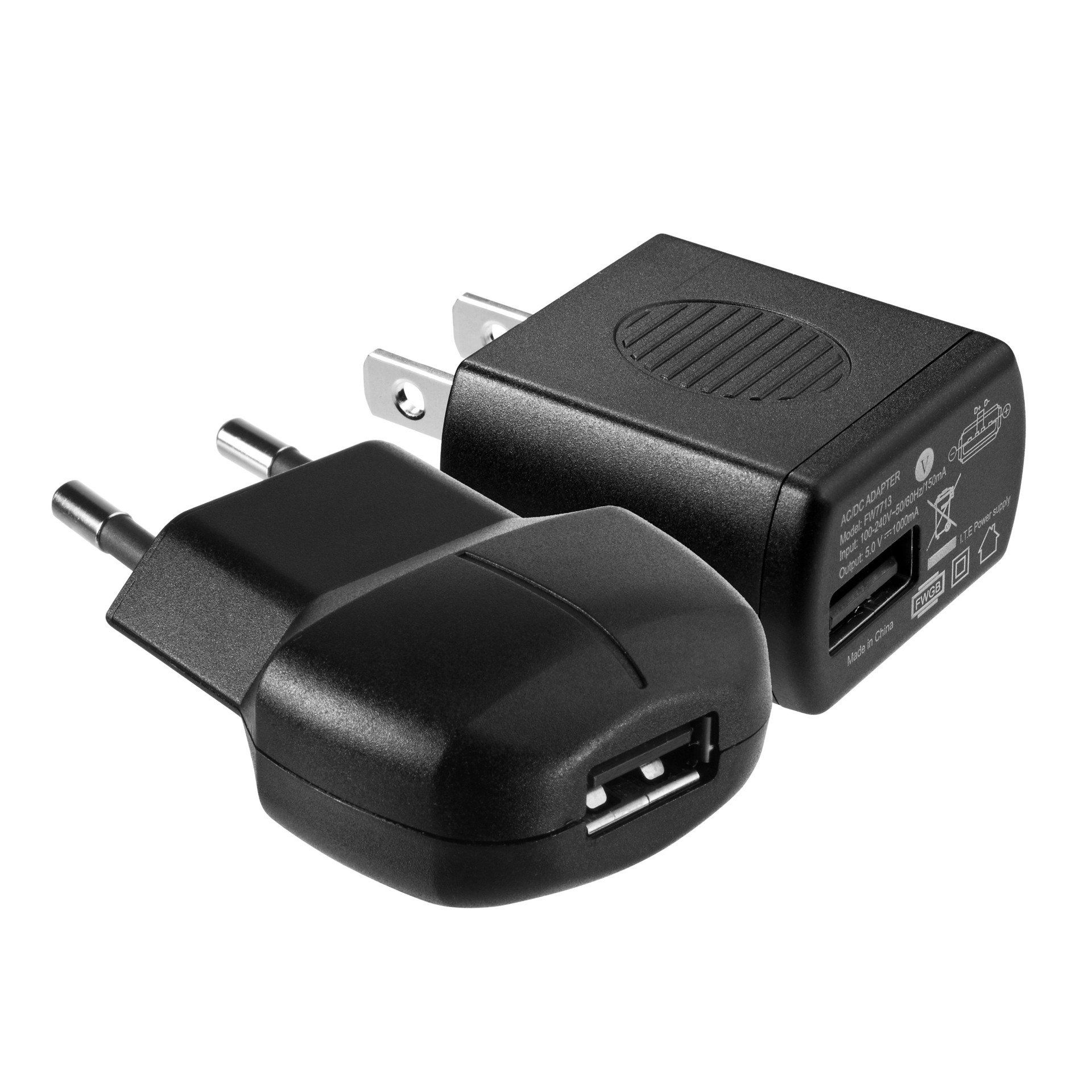 Two black USB chargers are sitting next to each other on a white background