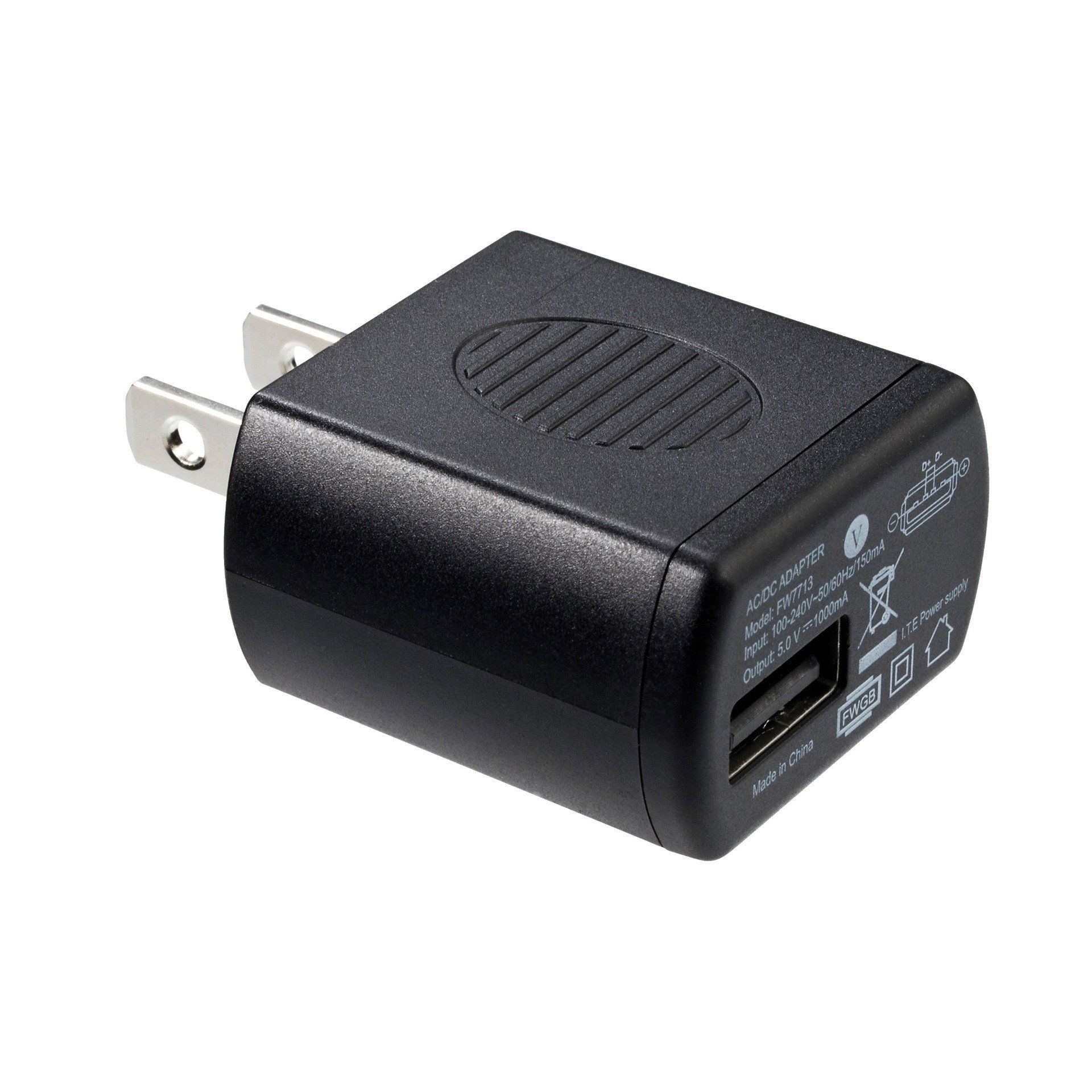 A black charger with a usb port on the side