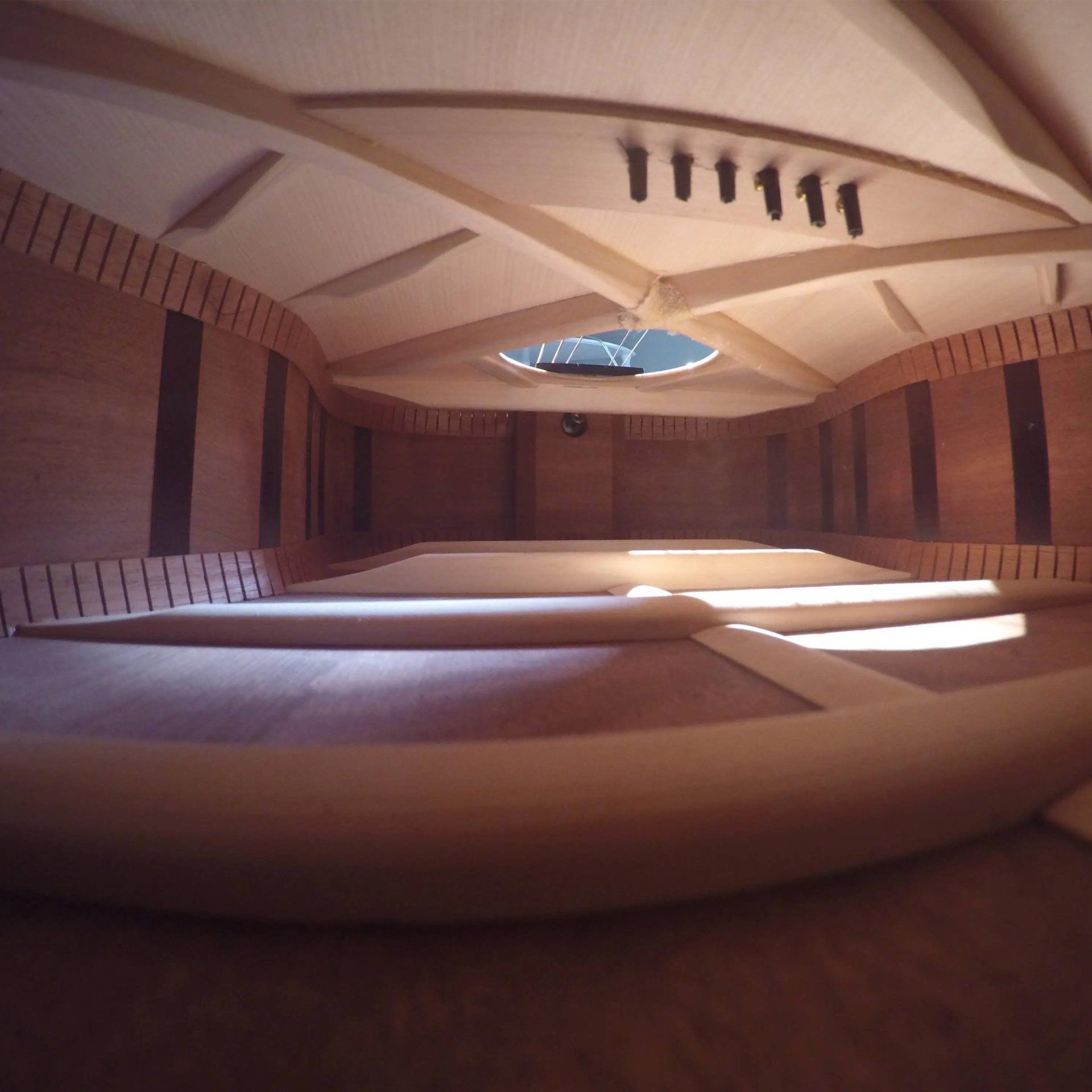 inside of an acoustic guitar
