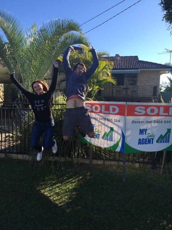 Couple doing a jump pose