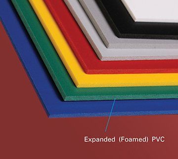 A stack of expanded foamed pvc sheets of different colors