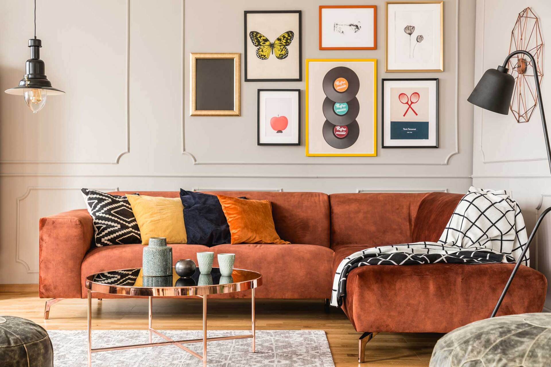Living Room with Velvet Corner Sofa with Pillows — Lowell, IN — Vintage Thrift