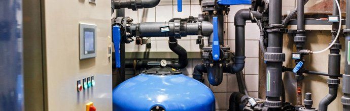 Water Heater in Blue Tank — Punta Gorda, FL — Five Star Plumbing Of SW Florida Water Heater in Blue Tank — Punta Gorda, FL — Five Star Plumbing Of SW Florida
