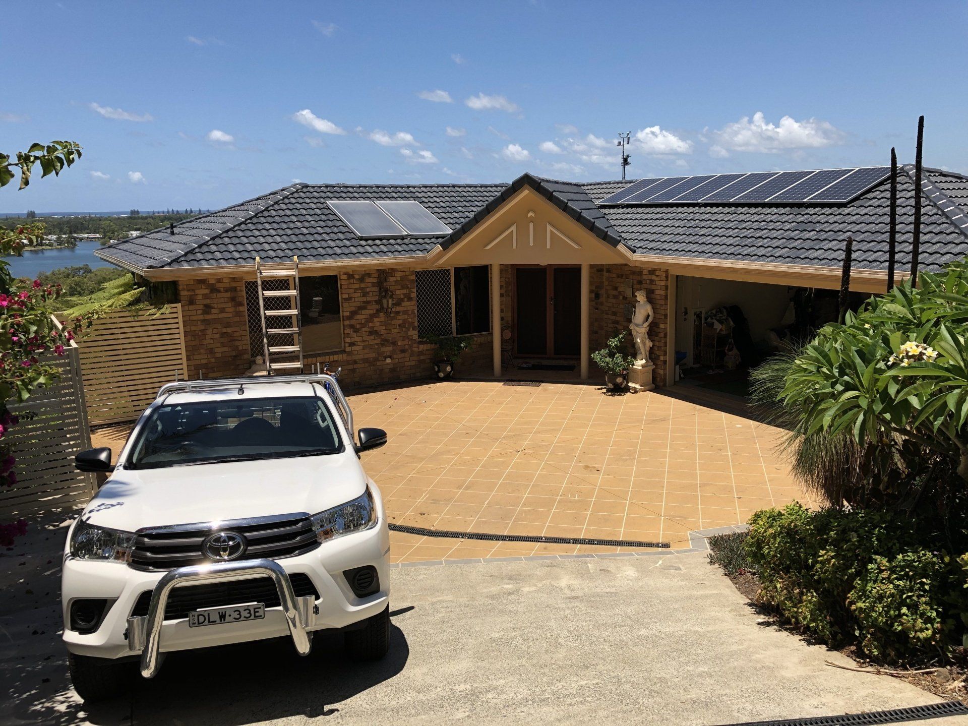 A House With Solar Panels on the Roof — Killiby & Co Roofing Pty Ltd in Tweed, NSW