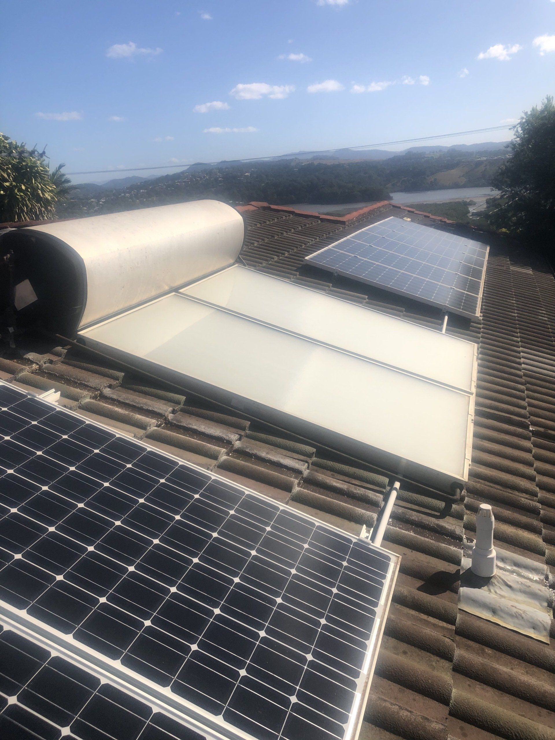 There Are Many Solar Panels on the Roof of a House — Killiby & Co Roofing Pty Ltd in Tweed, NSW