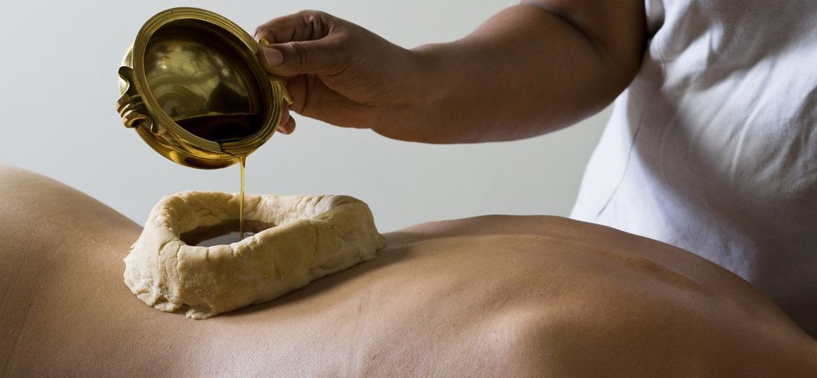 Massaggio con la cera calda