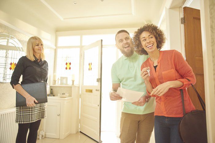 A happy couple gets keys to their new home