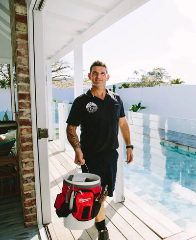 Plumber Carrying Tool Box — Emergency plumber in Tugun, QLD Plumber Carrying Tool Box —Emergency plumber in Tugun, QLD