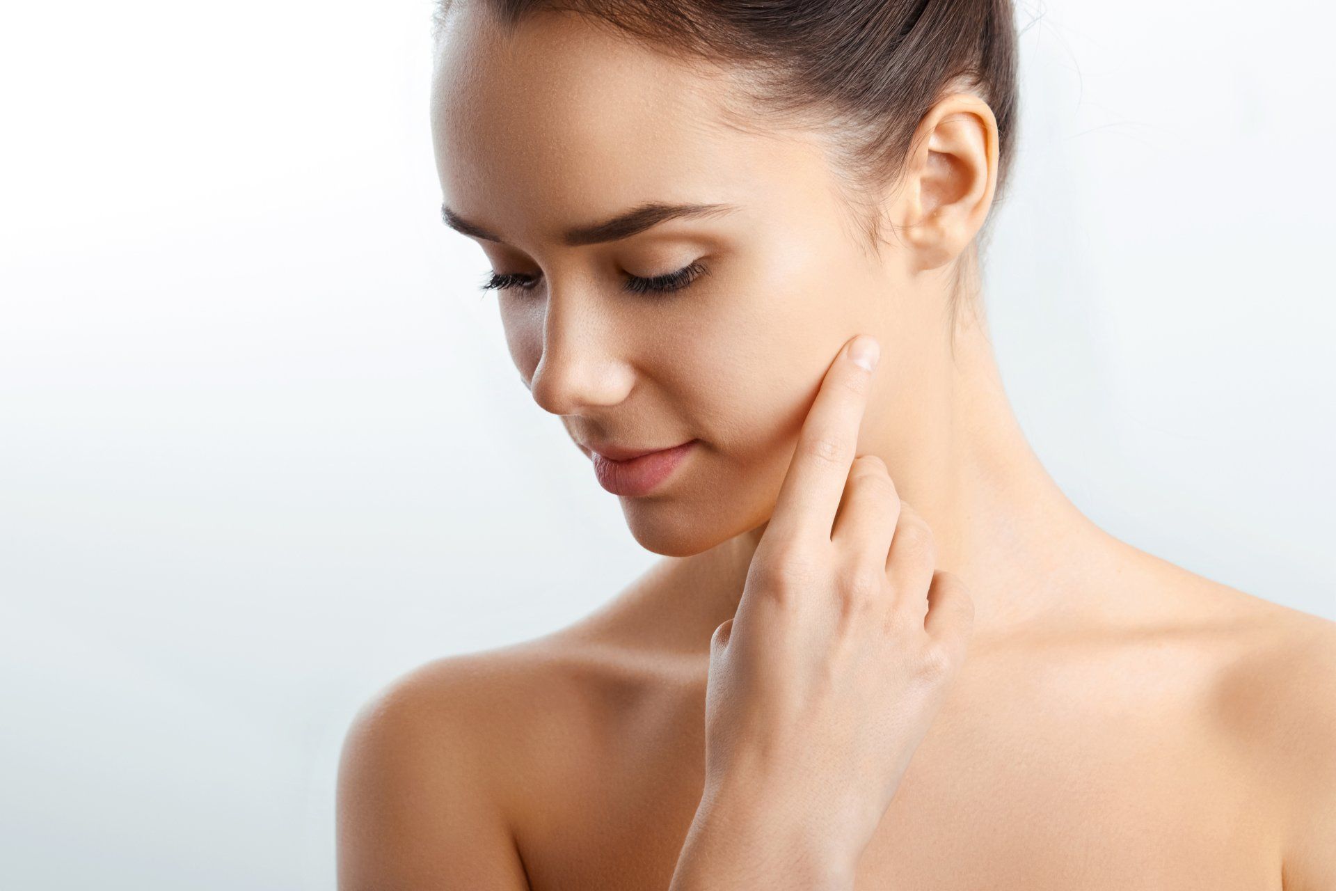 Closeup portrait of a woman with healthy smooth facial skin