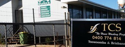 toowoomba commercial services black board with business name tcs