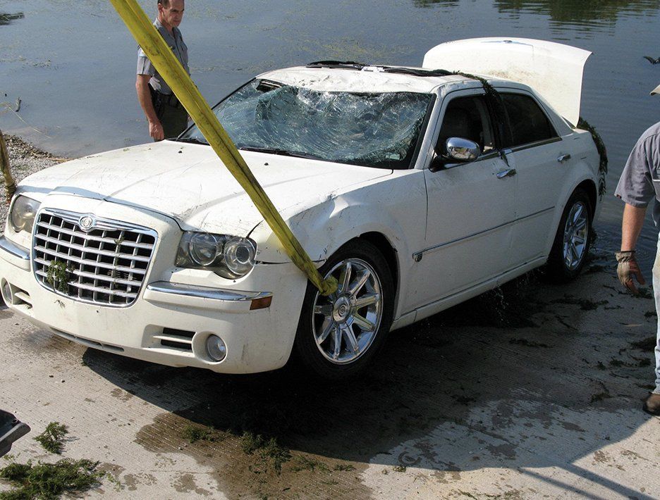 Allstar towing recovering a car out of the lake