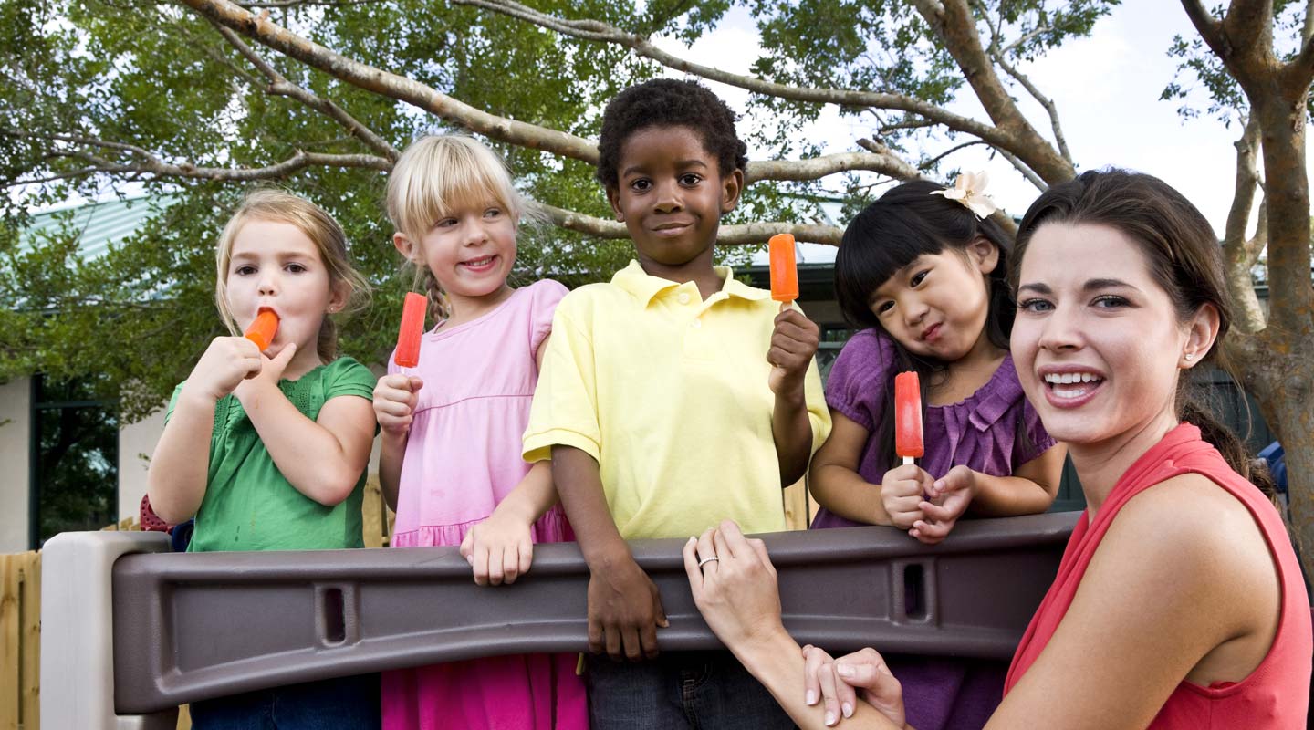 Kids enjoying with their teacher