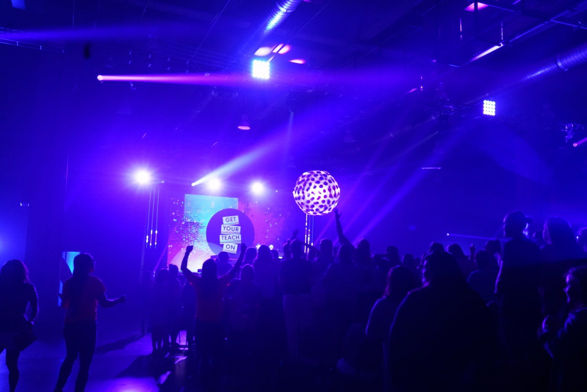 Dynamic event lighting and immersive entertainment creating an unforgettable corporate celebration.