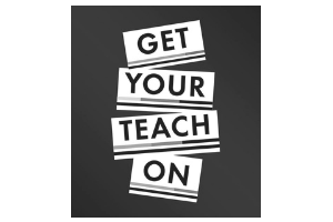 Black sign with stacked white blocks reading “GET YOUR TEACH ON”