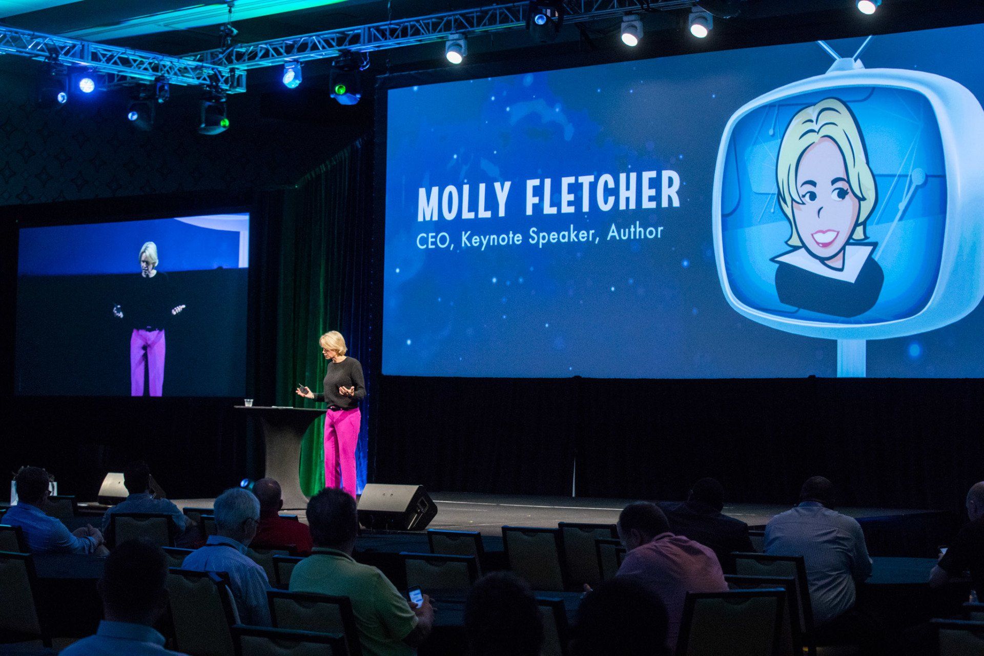 Keynote presentation enhanced with IMAG screens and custom presentation graphics at a corporate event.