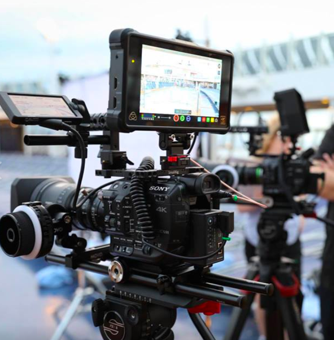 Professional cinema cameras configured for a multi-camera commercial video production.