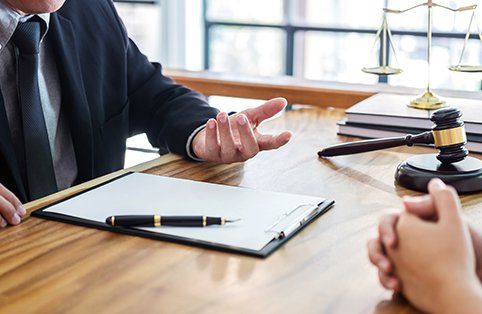 Local Lawyer — Lawyer & Client Talking in Lake City, FL Local Lawyer — Lawyer & Client Talking in Lake City, FL