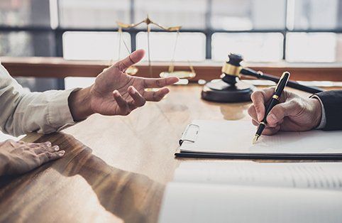 Wills — Client & Lawyer Discussing About Wills in Lake City, FL Wills — Client & Lawyer Discussing About Wills in Lake City, FL