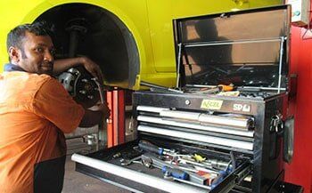 Man with Tools — Towing Services in Winnellie, NT Man with Tools — Towing Services in Winnellie, NT