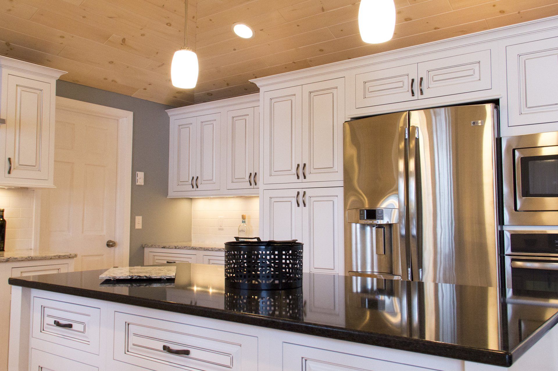 Stylish Kitchen Cabinets — Classic White Colored Cabinetry in Traverse City, MI