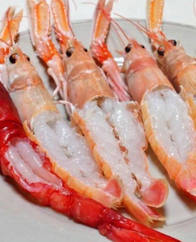 scampi crudi