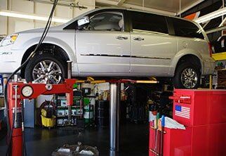 An automobile ready for engine repair in Duluth, MN