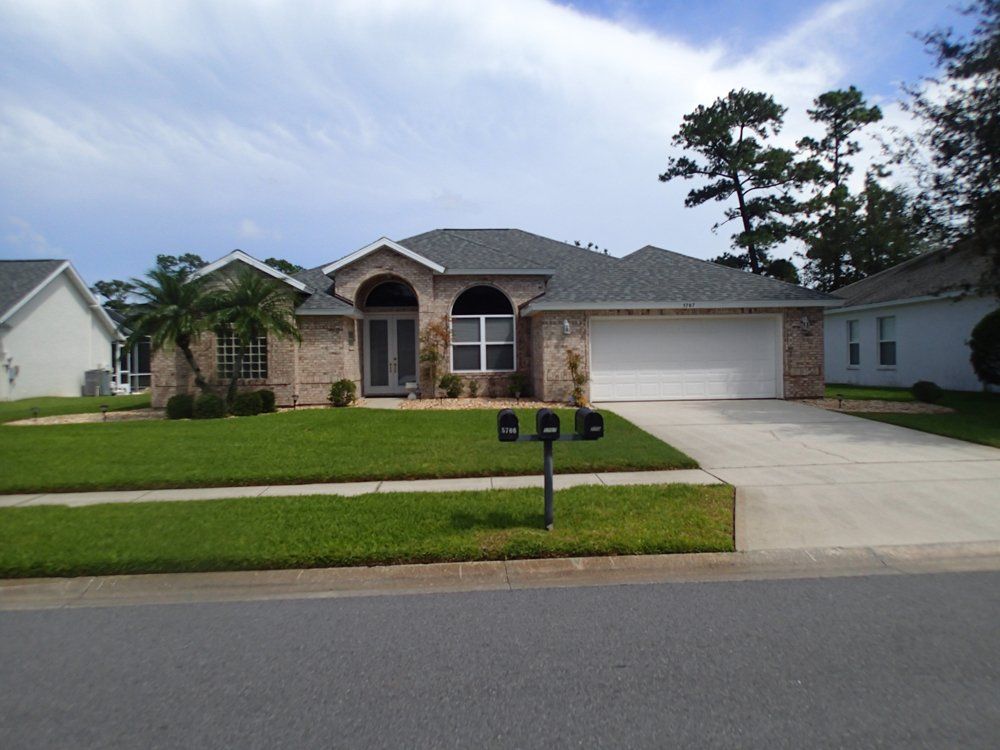 House With Carport — South Daytona Beach, FL — Dal Mar Roofing Industries Inc