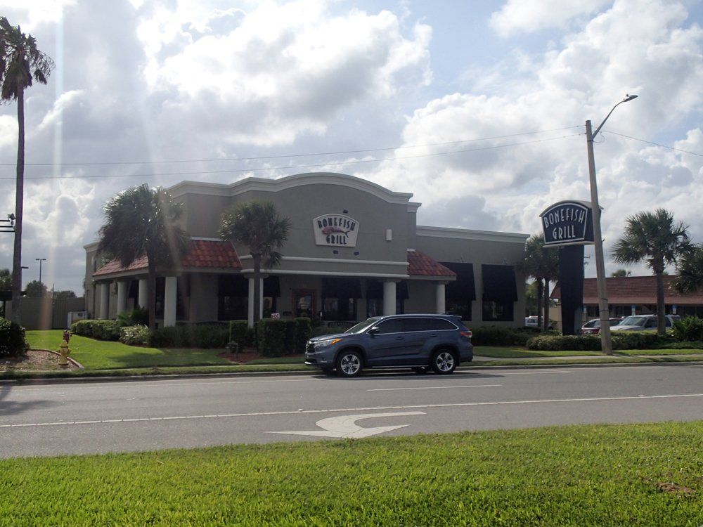Car in Front of Bonefish Grill — South Daytona Beach, FL — Dal Mar Roofing Industries Inc